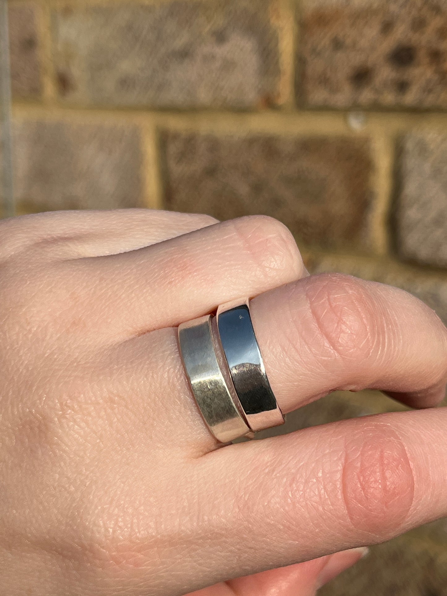a comparative photo of the difference between satin and high polish finishes
