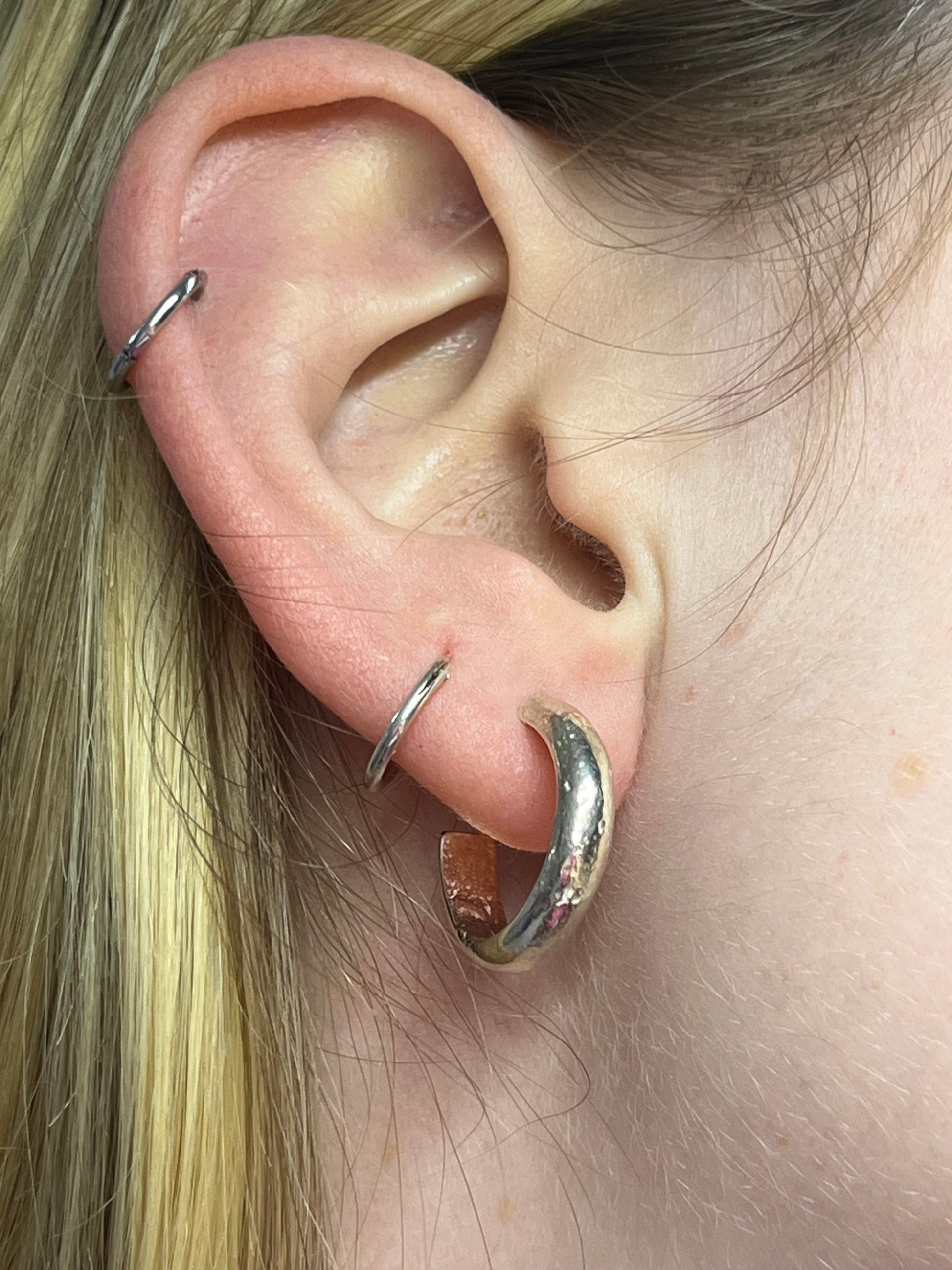 crater hoops pictured in ear