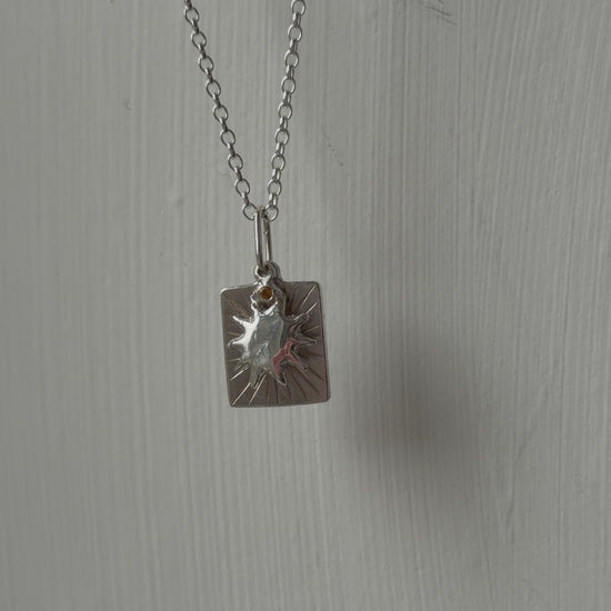 Beaming sun necklace moving