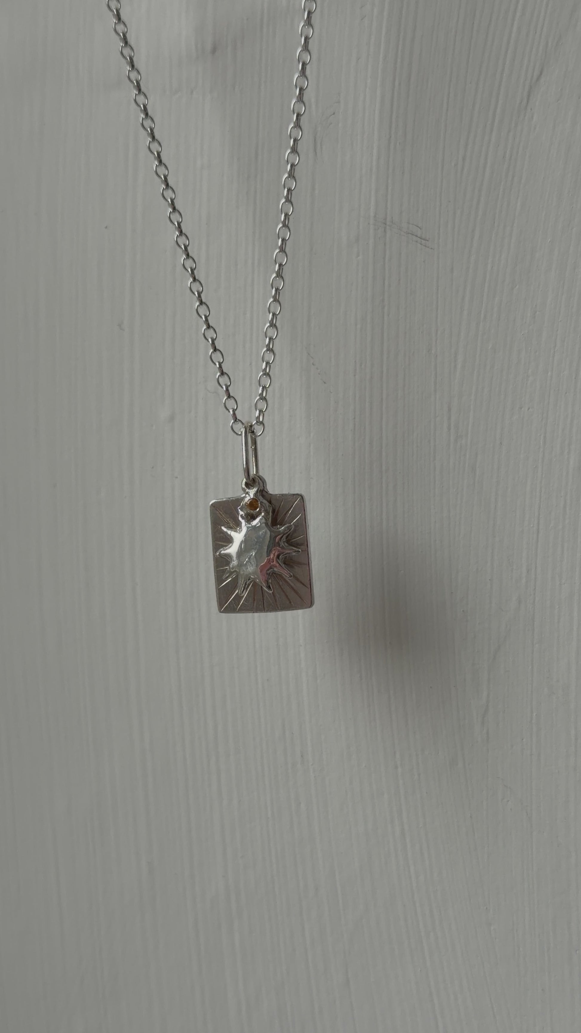 Beaming sun necklace moving